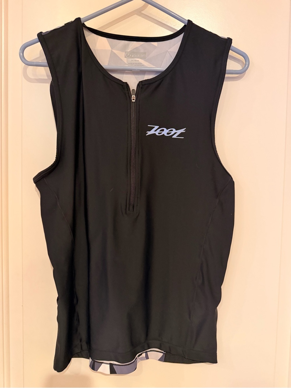 Zoot athletic top black with black design in a women’s size XL